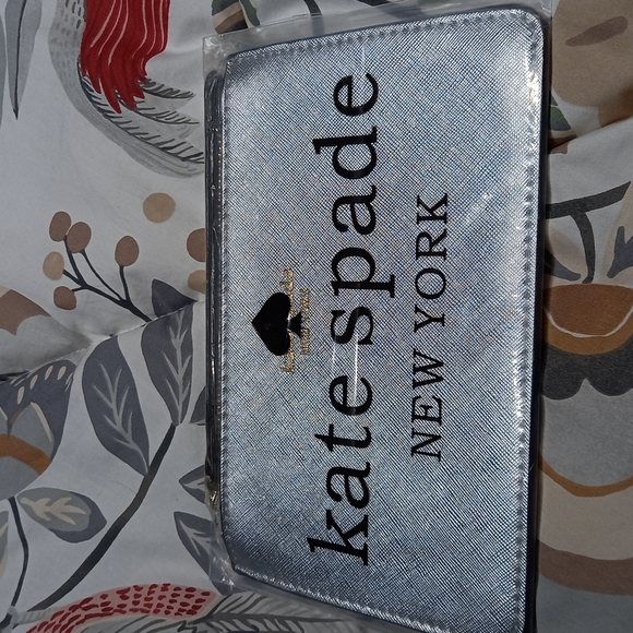 SOLD:Kate Spade grey wristlet small NWT